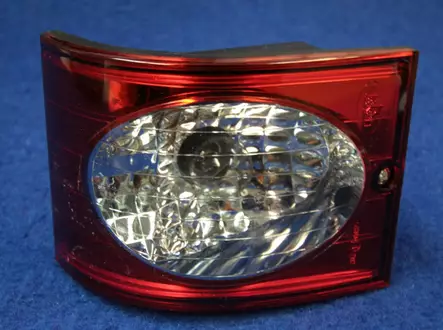 Peruutusvalo kulmaan 100x123mm Heijastin, e1 2117, W 810/12 - Ajoneuvovalaisimet - 570 - 2